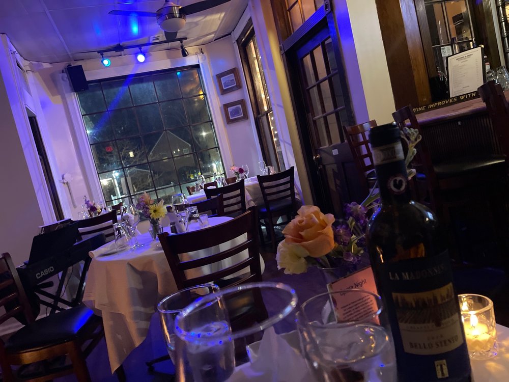 Blue lighting dining room at Trattoria Da Franco's